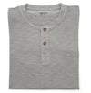 Folded Monument gray henley shirt with brand logo on a white background
