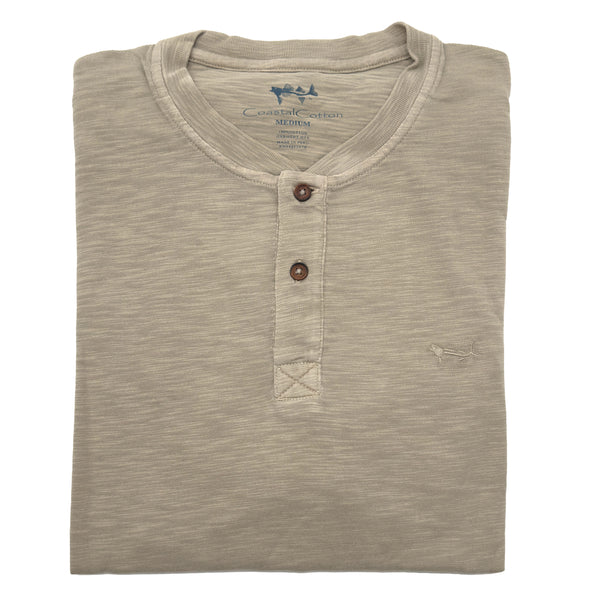 Folded Aluminum henley shirt with button details on a white background